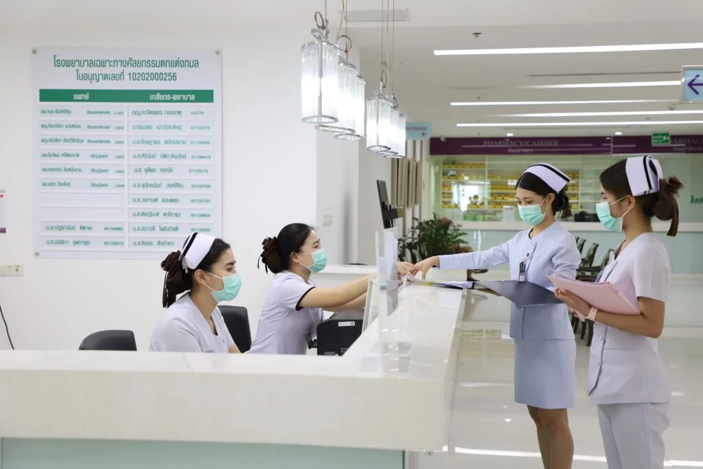 Modern nursing station and recovery ward design at Kamol Cosmetic Hospital.